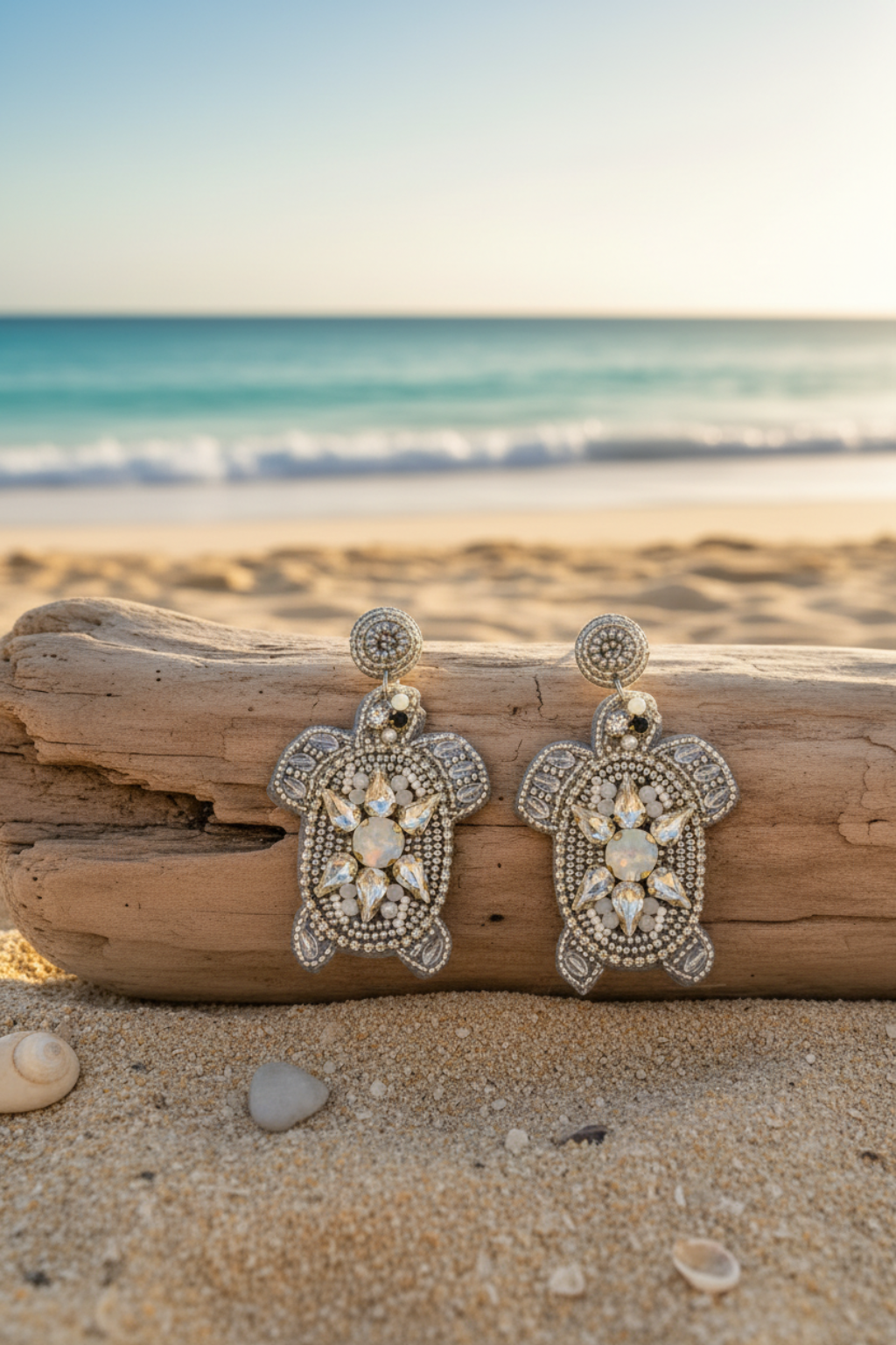 Silver turtle earrings in 2:3 ratio